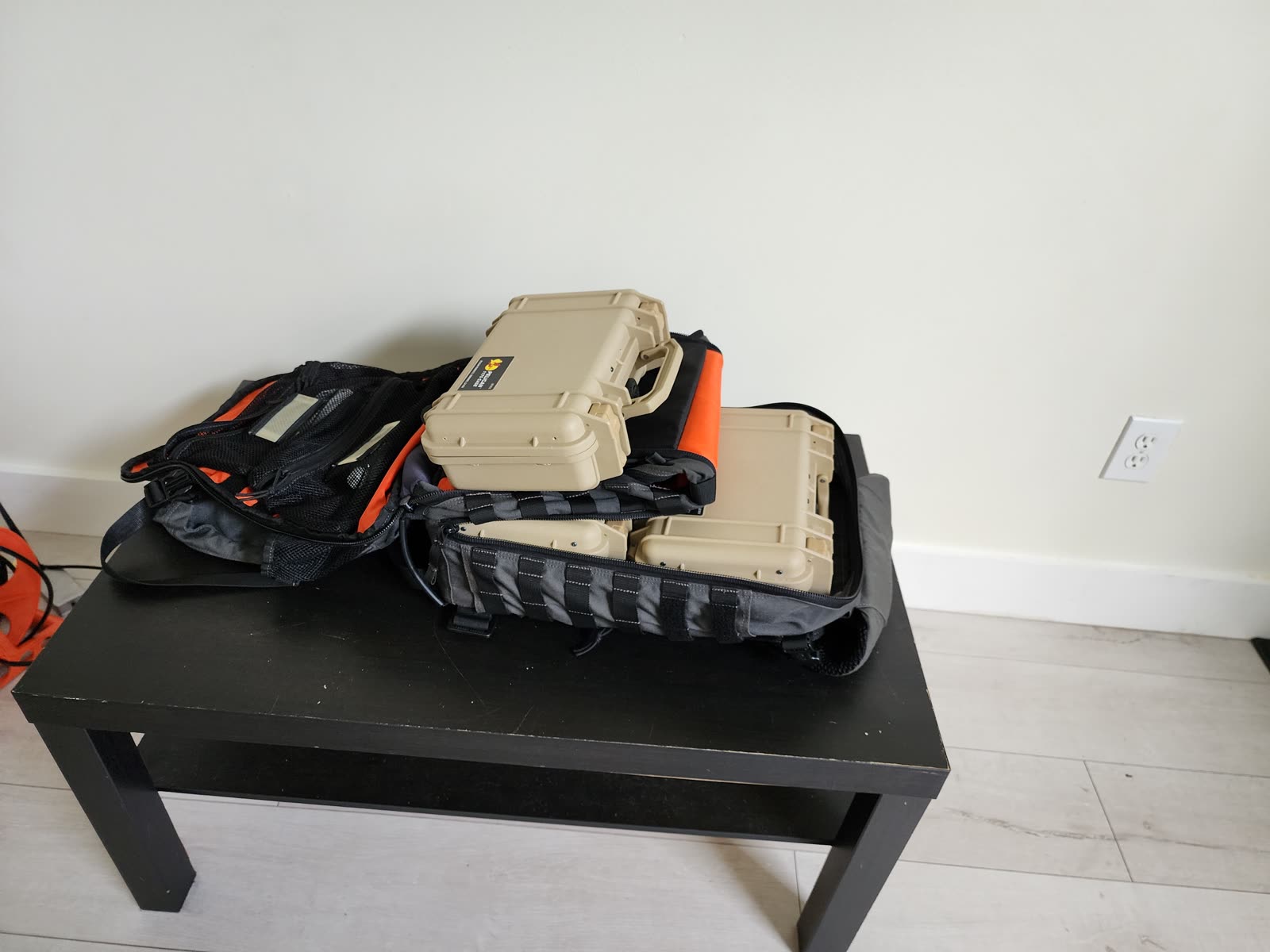 Station cases packed in transport backpacks